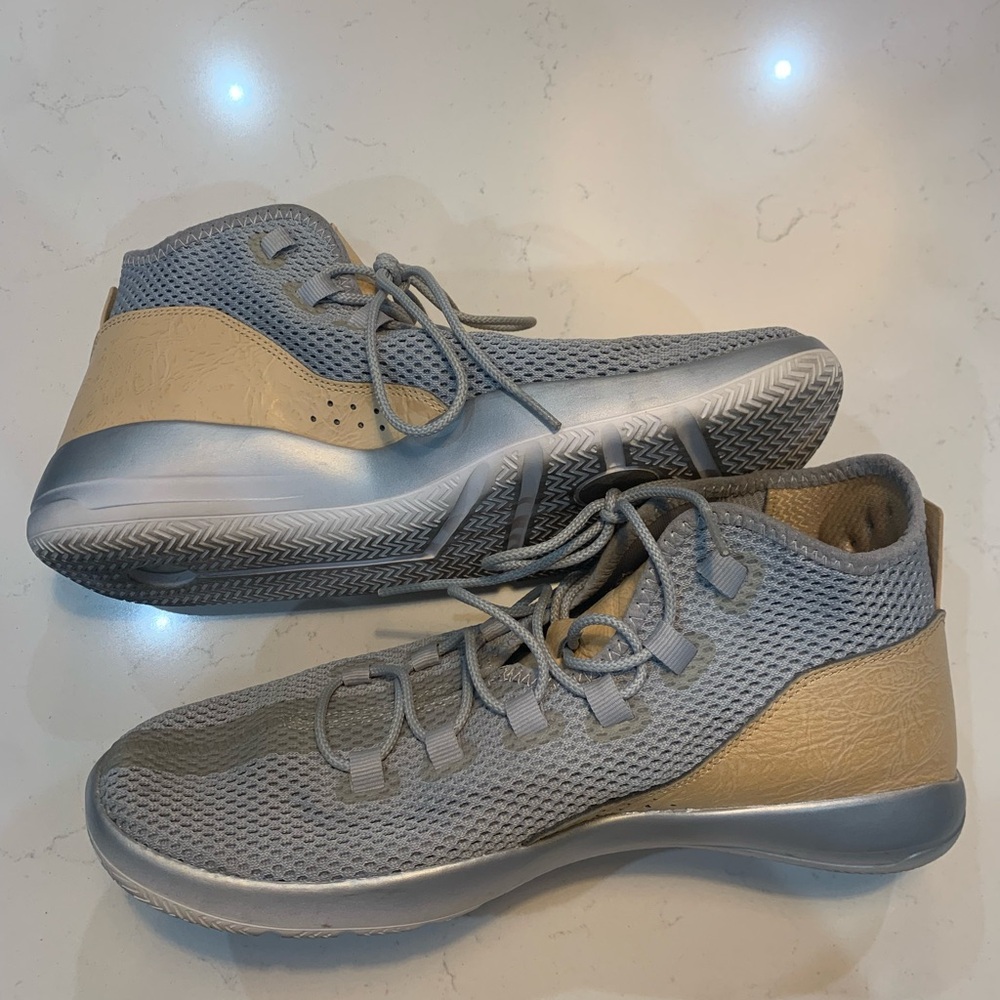 Nike Jordan Reveal’s Gray and Beige Athletic Shoes